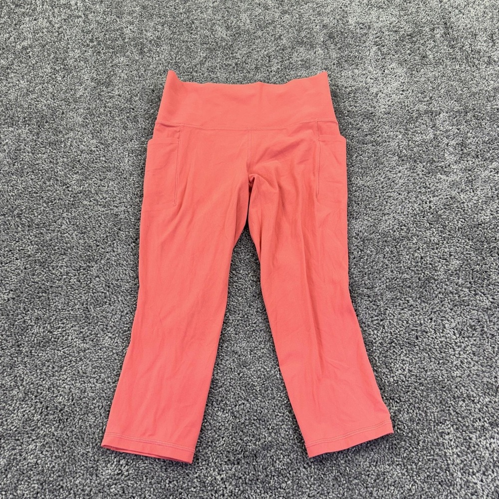 Athleta Leggings Womens Medium Pink Salutation Stash Pocket II Capri Yoga Gym